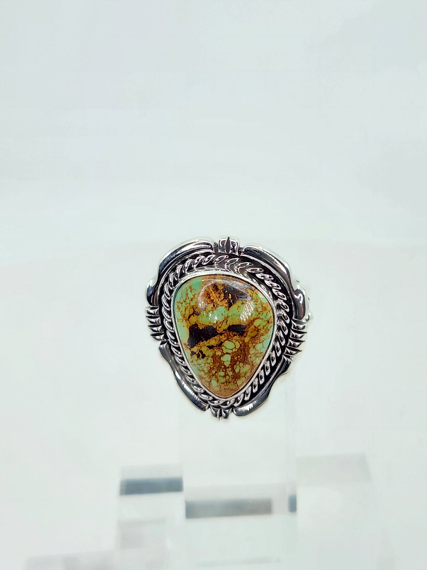 Desert Treasure: Green and Brown Turquoise Ring set in Intricate Sterling Silver