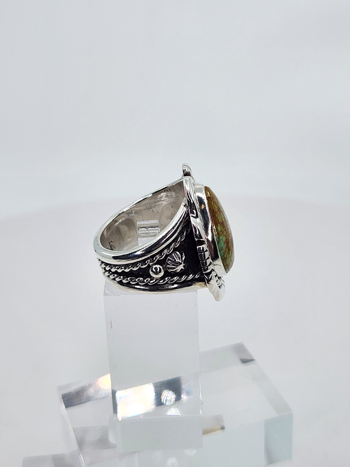 Desert Treasure: Green and Brown Turquoise Ring set in Intricate Sterling Silver