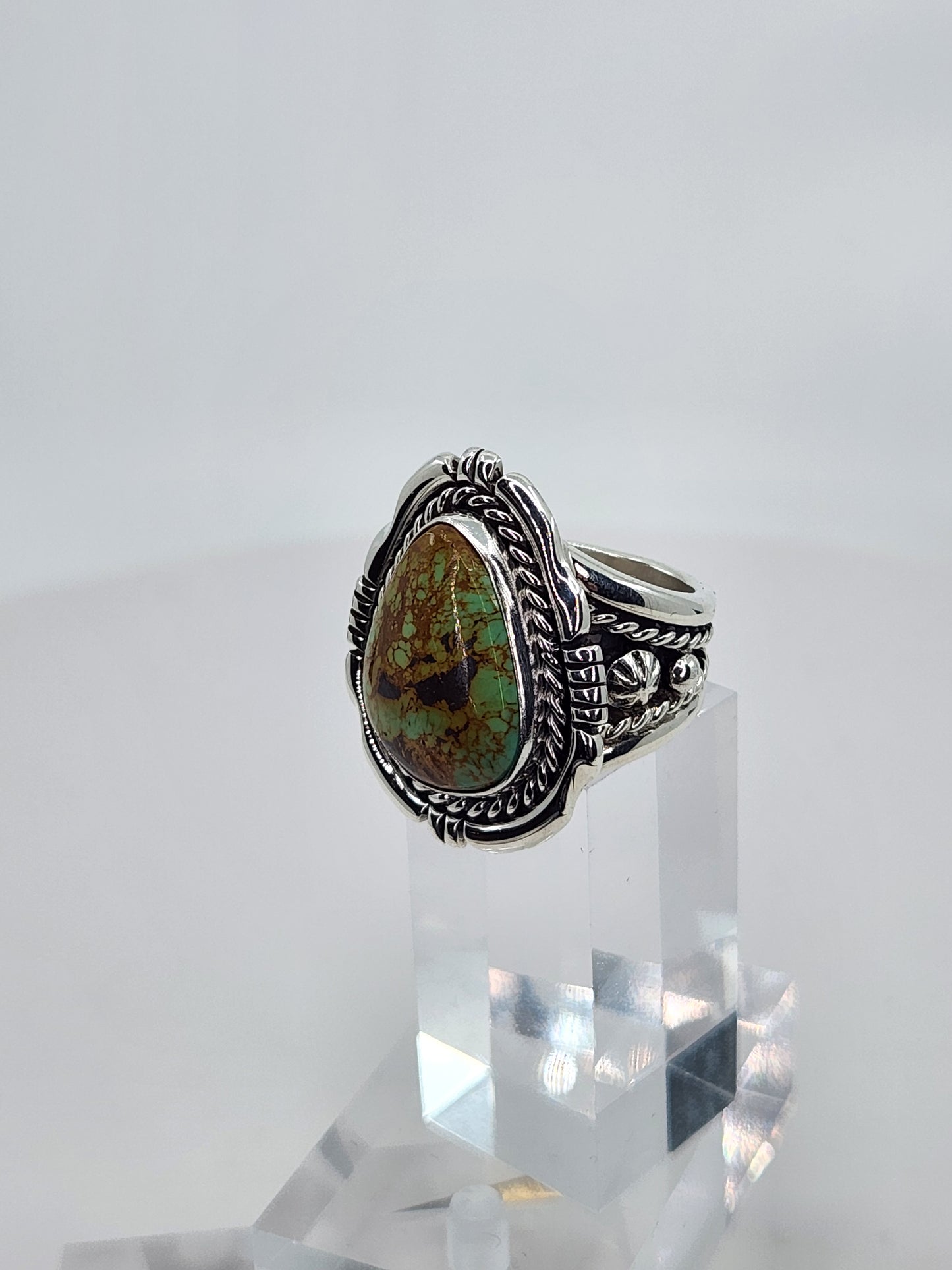 Desert Treasure: Green and Brown Turquoise Ring set in Intricate Sterling Silver