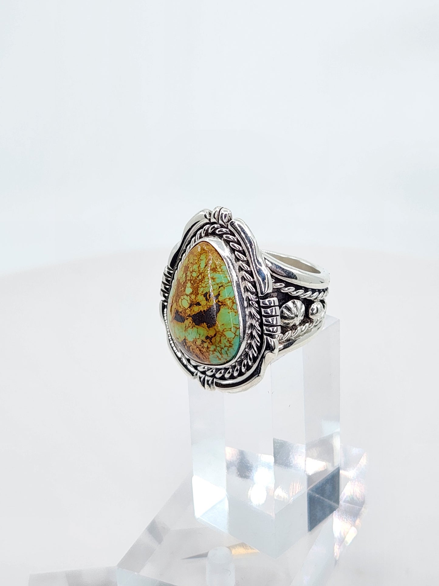 Desert Treasure: Green and Brown Turquoise Ring set in Intricate Sterling Silver