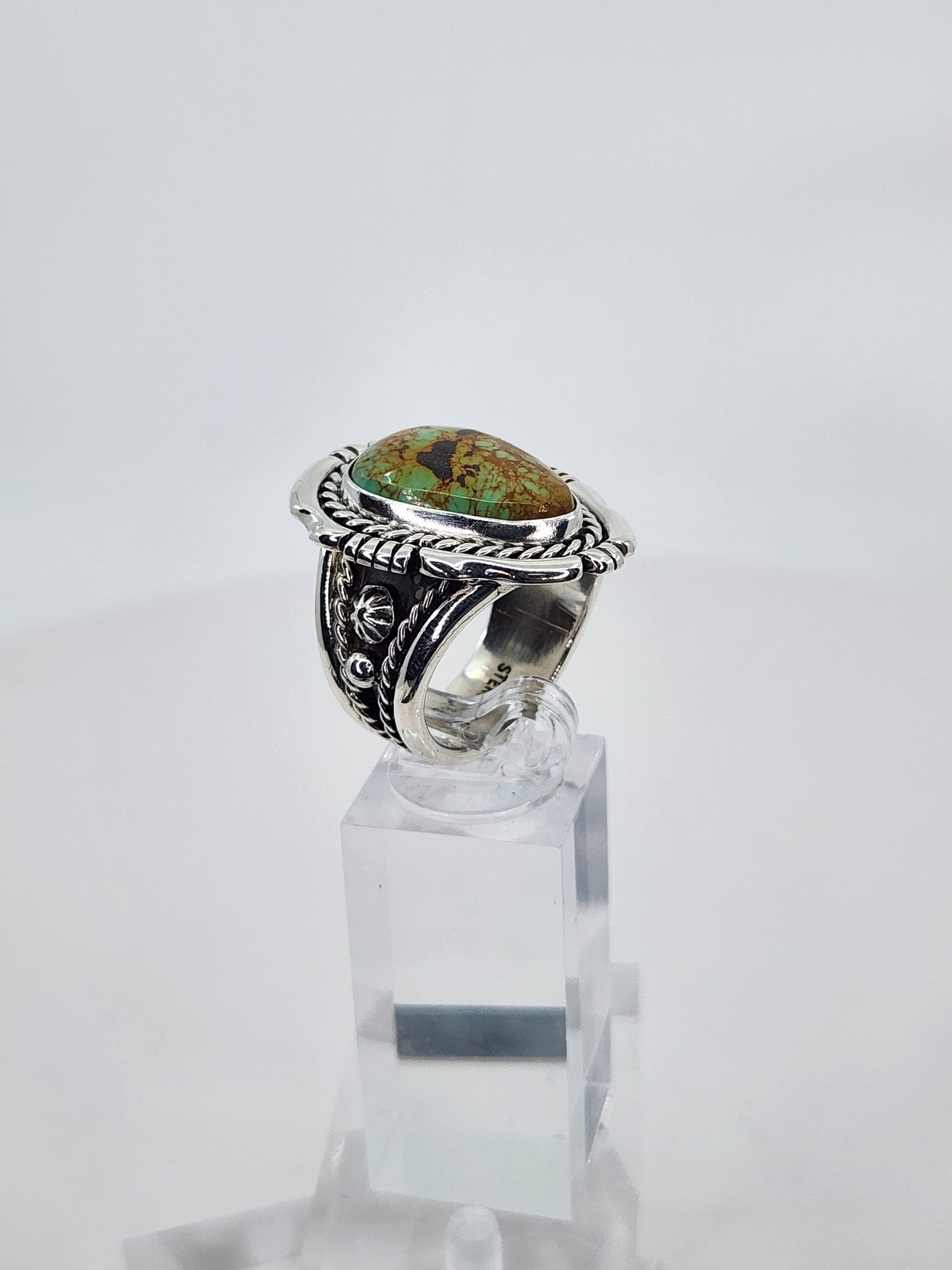 Desert Treasure: Green and Brown Turquoise Ring set in Intricate Sterling Silver