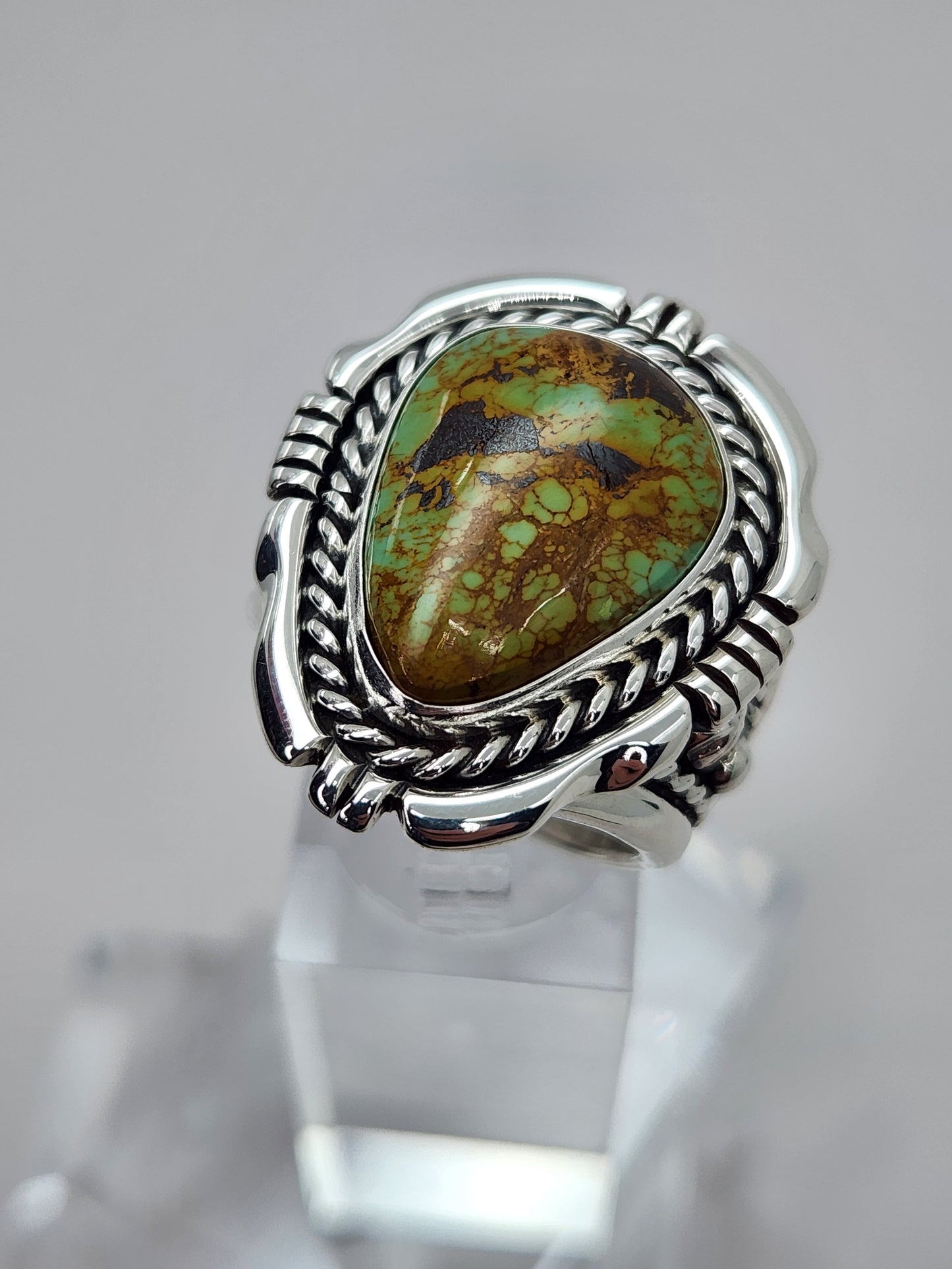 Desert Treasure: Green and Brown Turquoise Ring set in Intricate Sterling Silver