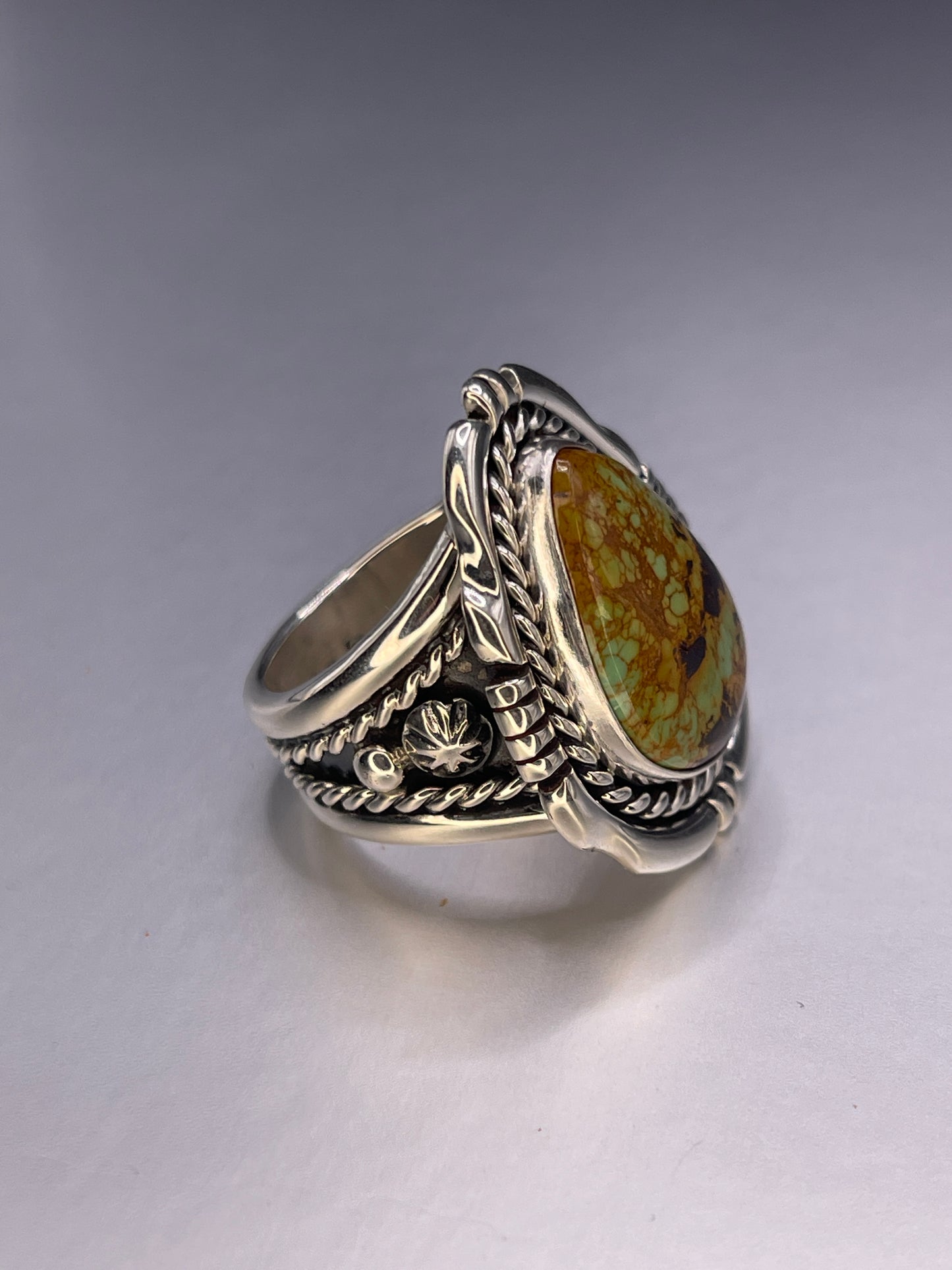Desert Treasure: Green and Brown Turquoise Ring set in Intricate Sterling Silver