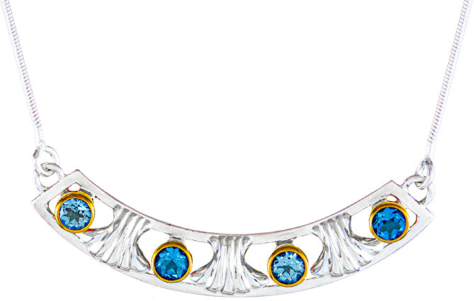 Sterling Silver and 22K Gold Vermeil Pendant with Baby Blue Topaz and Sky Blue Topaz