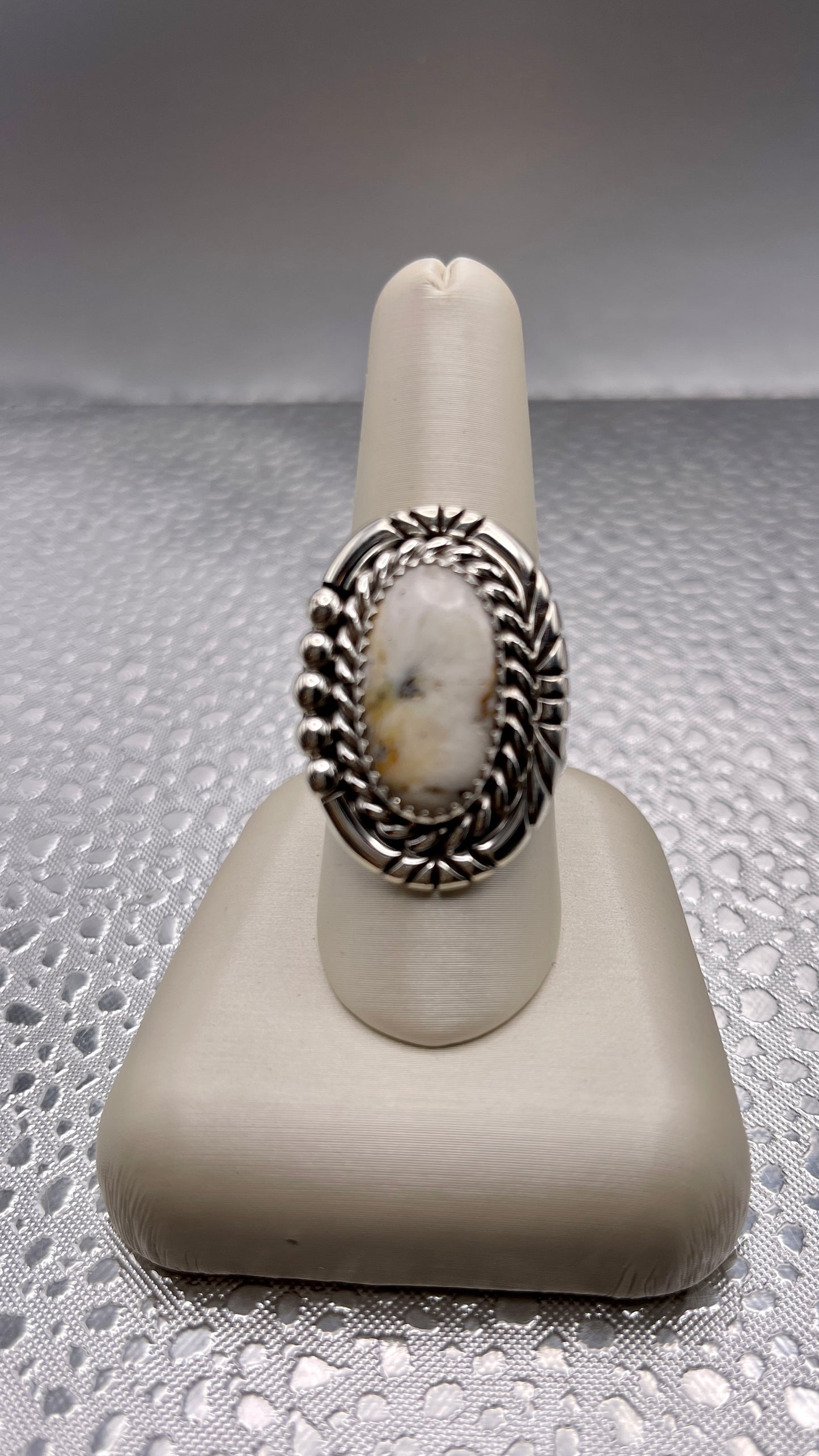 Desert Treasure: White Buffalo, black and white stone set in Sterling Silver Ring