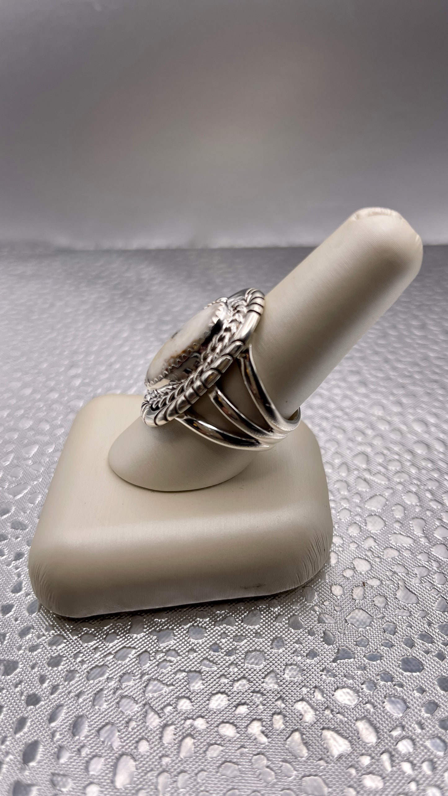 Desert Treasure: White Buffalo, black and white stone set in Sterling Silver Ring
