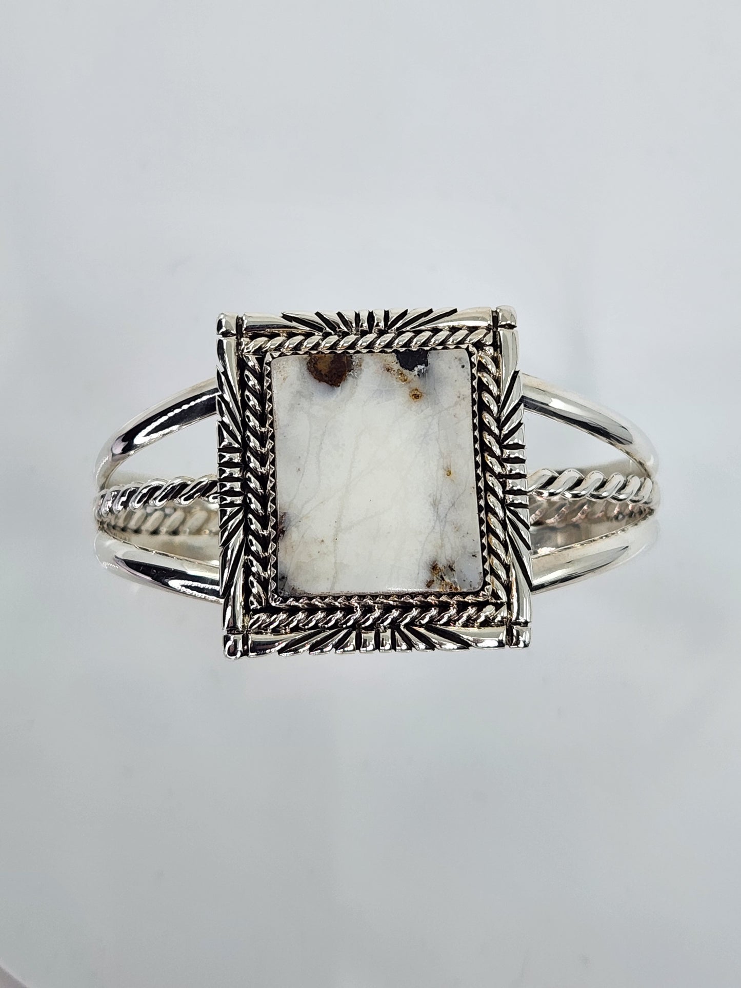 Desert Treasure: White Buffalo, white & black stone set in Sterling Silver bracelet