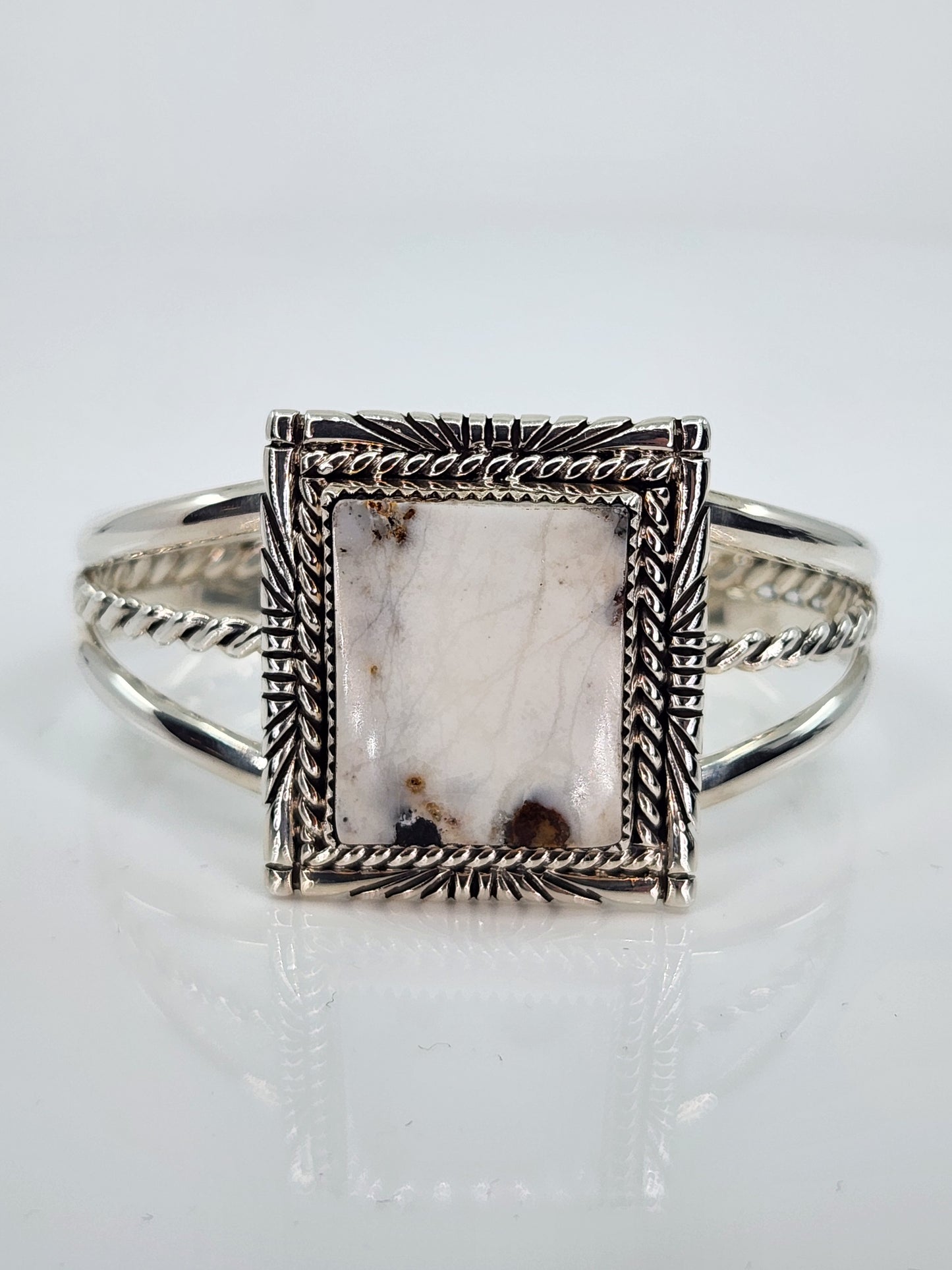 Desert Treasure: White Buffalo, white & black stone set in Sterling Silver bracelet