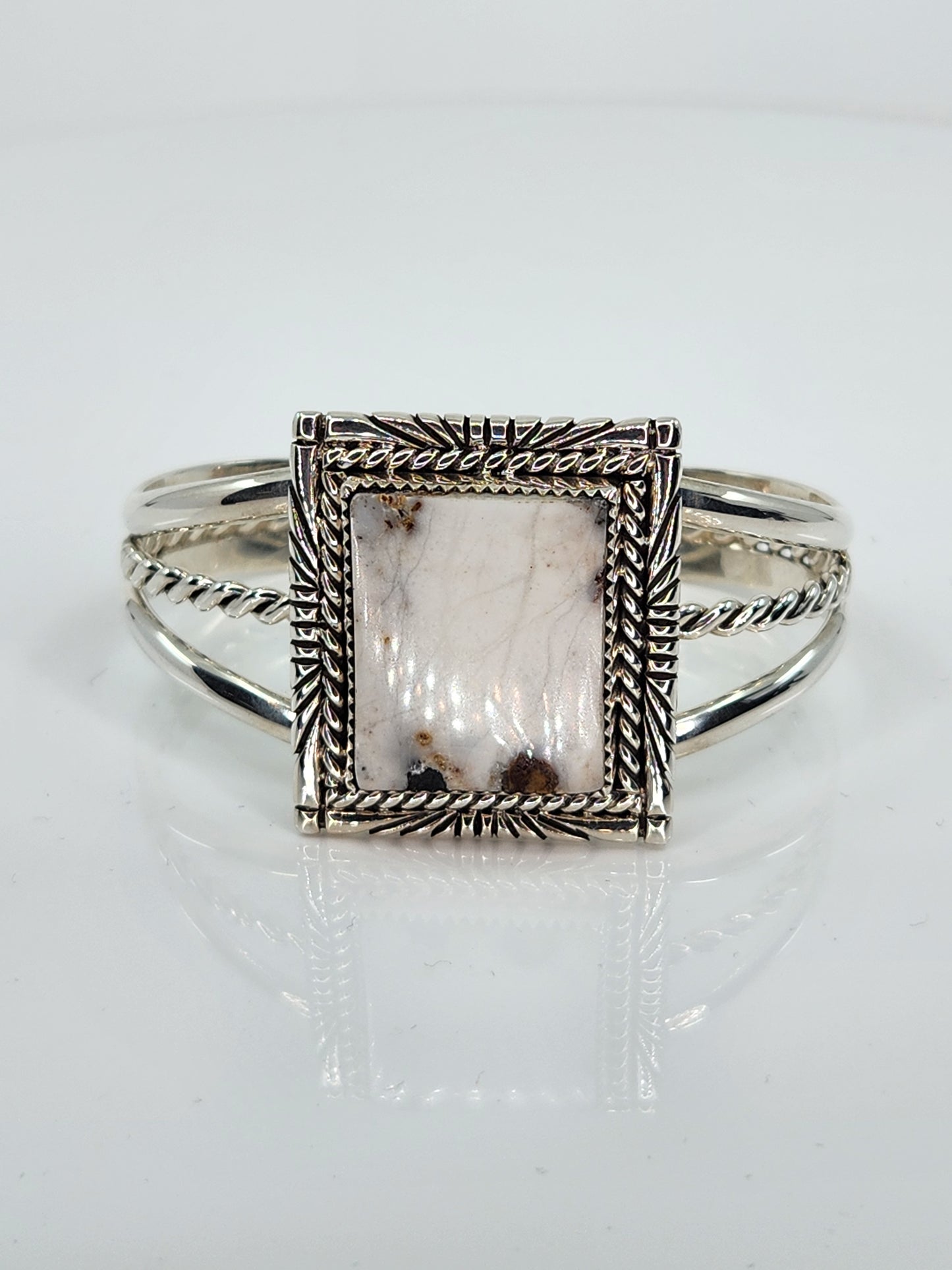 Desert Treasure: White Buffalo, white & black stone set in Sterling Silver bracelet