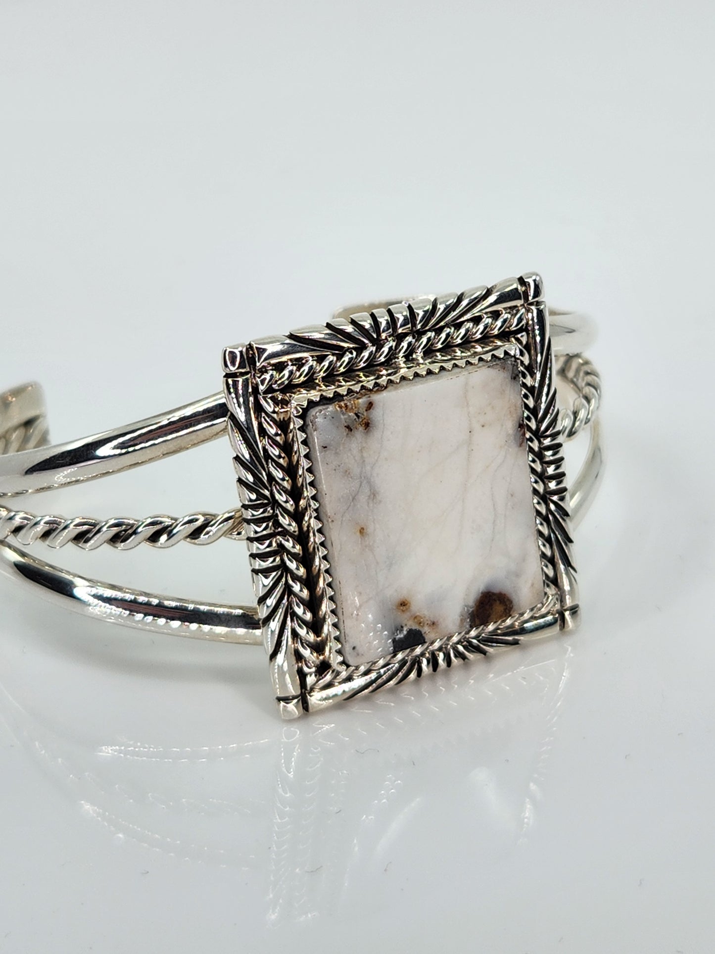 Desert Treasure: White Buffalo, white & black stone set in Sterling Silver bracelet