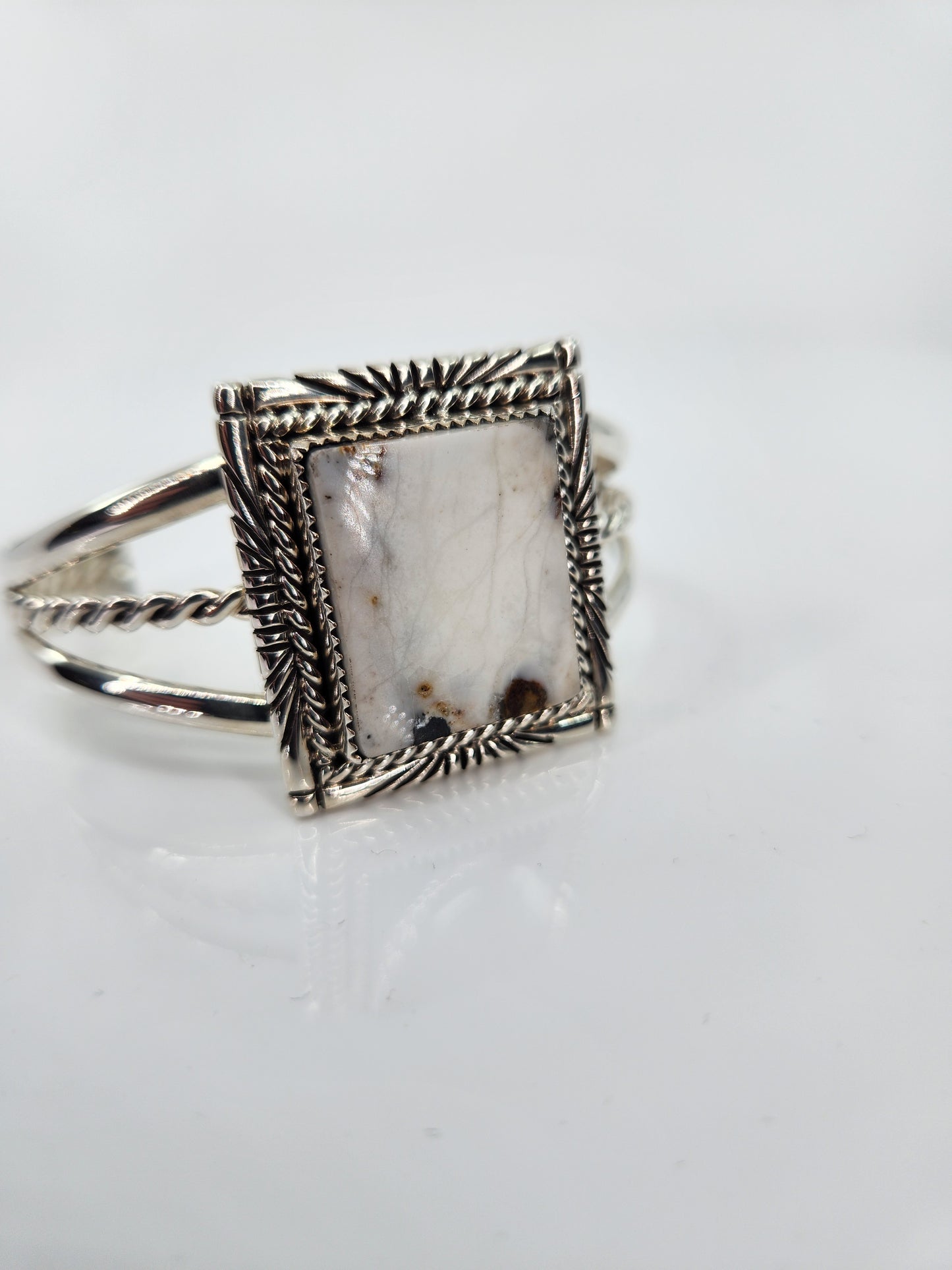 Desert Treasure: White Buffalo, white & black stone set in Sterling Silver bracelet