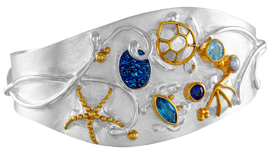 Sterling Silver Bracelet with Sky Blue Topaz, White Freshwater Pearl, Baby Blue Topaz and Trendy Solo Topaz
