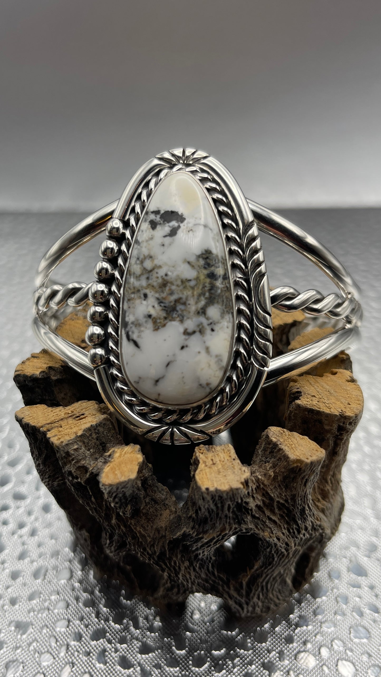 Desert Treasure: White Buffalo, white & black stone set in Sterling Silver bracelet